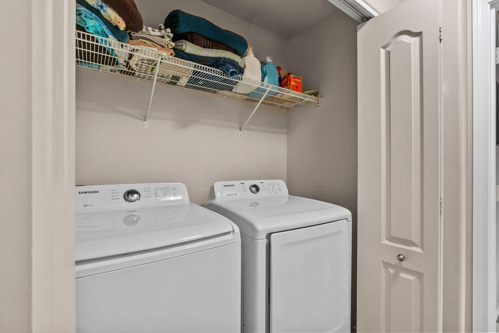 3144 Northeast Wells Acres Road Bend, OR 97701 - Photo 14 of 24 a utility room with dryer and washer
