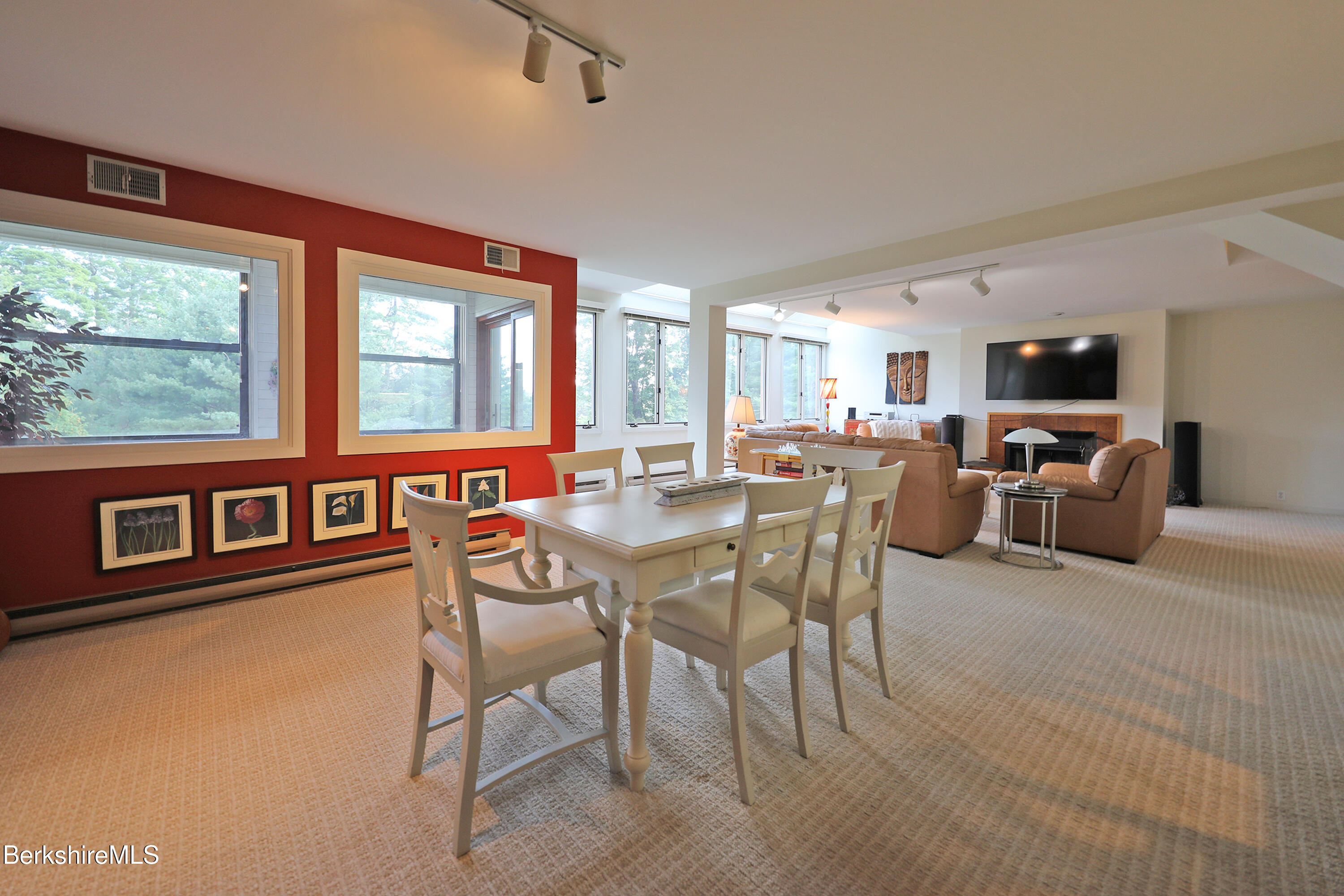 19 Hawthorne Road, Unit CARRIAGE BARN E2 Stockbridge, MA 01262 - Photo 10 of 47 a view of a livingroom with furniture window and outside view