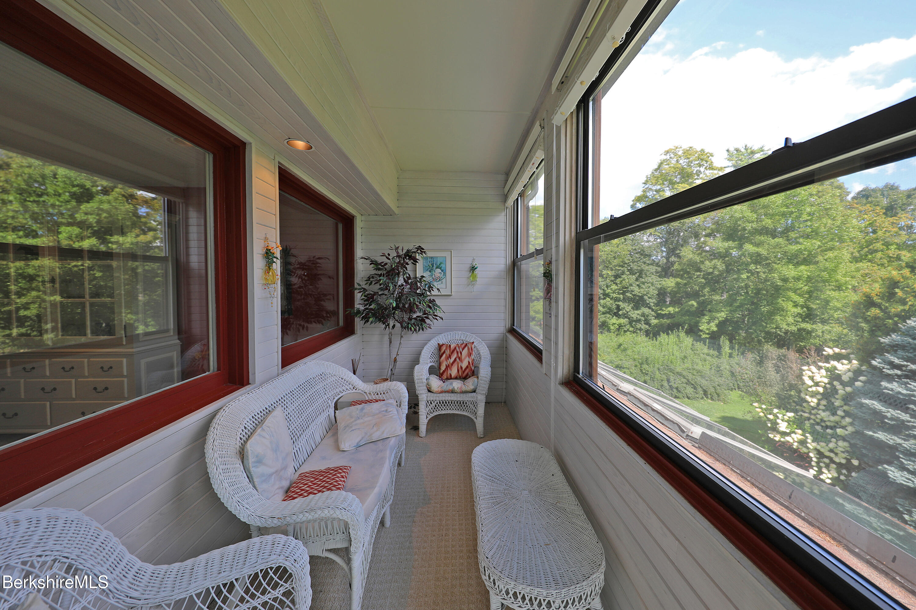 19 Hawthorne Road, Unit CARRIAGE BARN E2 Stockbridge, MA 01262 - Photo 17 of 47 a outdoor dining space with furniture and garden view