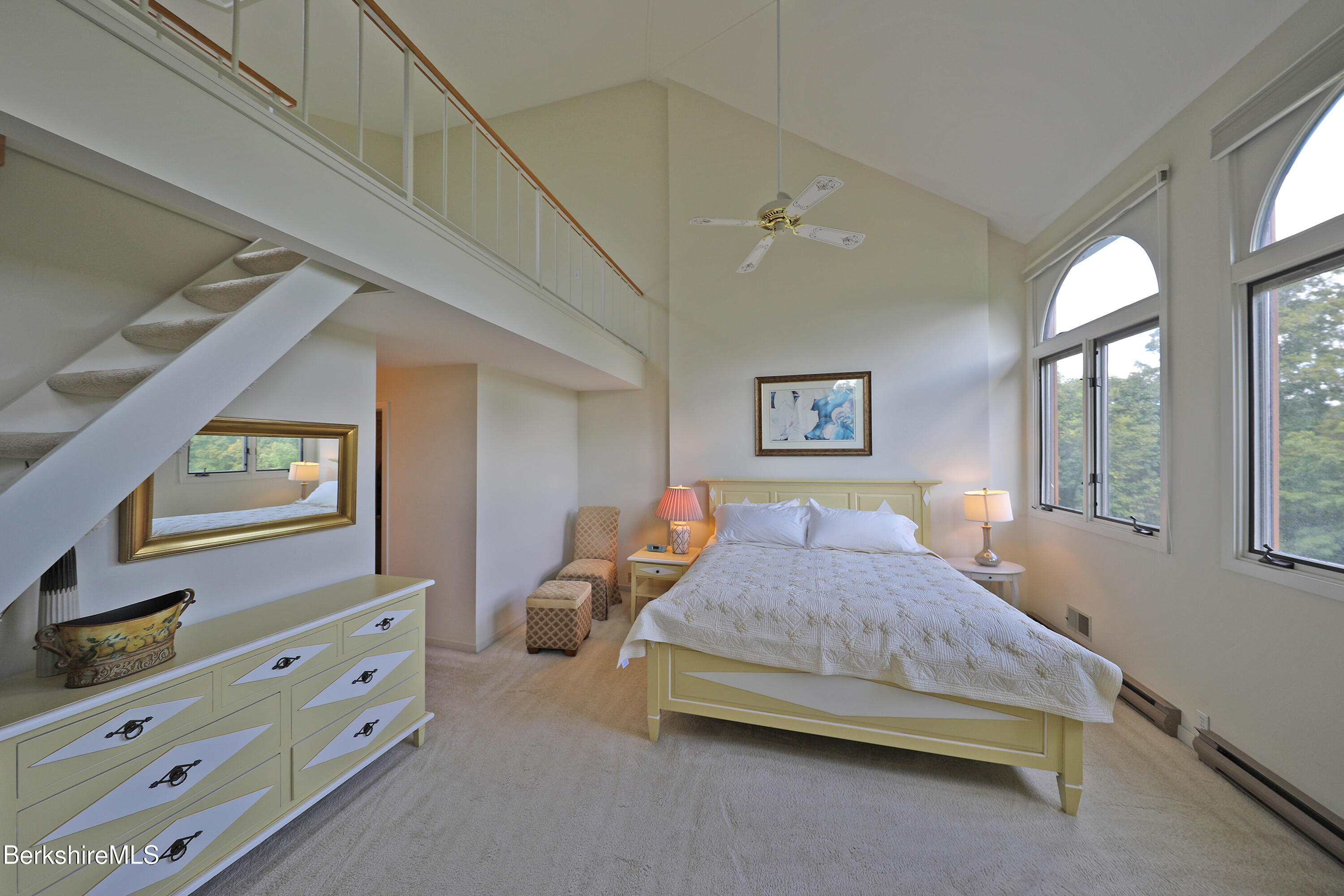 19 Hawthorne Road, Unit CARRIAGE BARN E2 Stockbridge, MA 01262 - Photo 23 of 47 a bedroom with a bed and a dresser