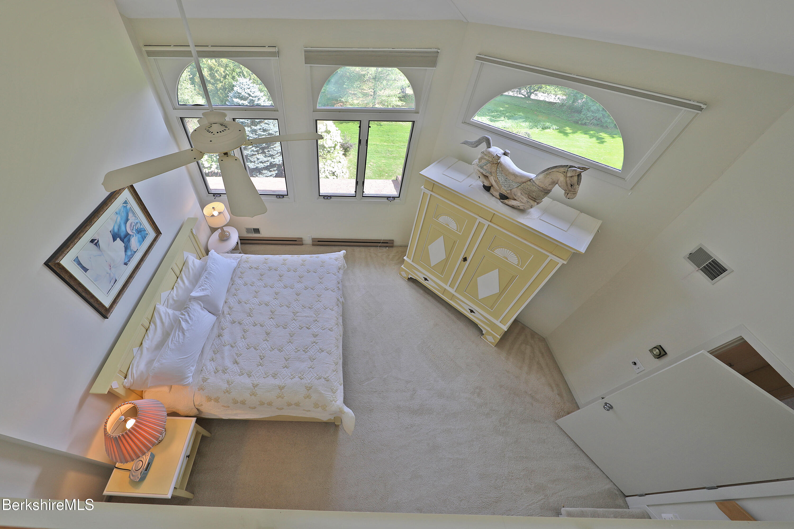 19 Hawthorne Road, Unit CARRIAGE BARN E2 Stockbridge, MA 01262 - Photo 30 of 47 a living room with furniture and a fireplace