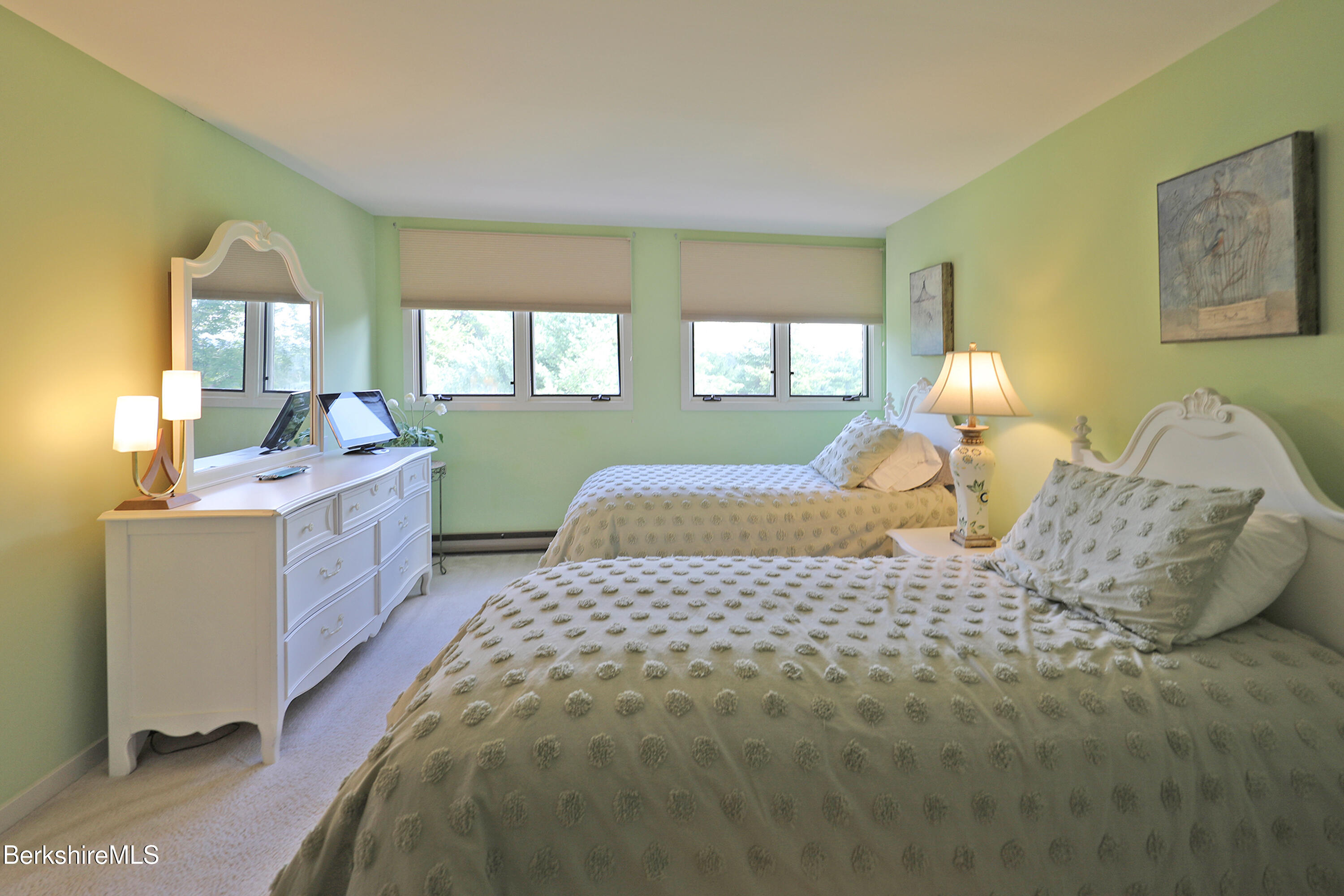 19 Hawthorne Road, Unit CARRIAGE BARN E2 Stockbridge, MA 01262 - Photo 32 of 47 a bedroom with a bed and a dresser