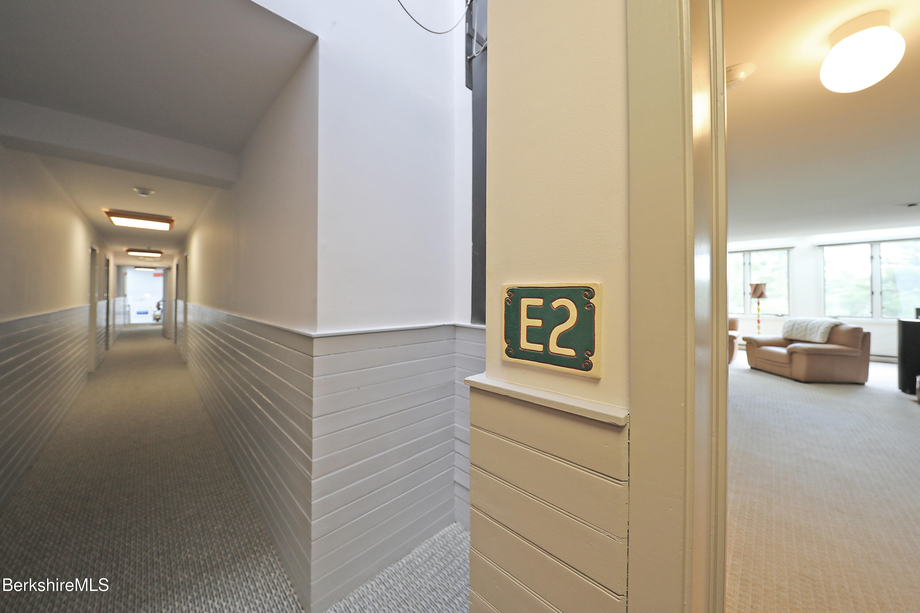 19 Hawthorne Road, Unit CARRIAGE BARN E2 Stockbridge, MA 01262 - Photo 35 of 47 a view of a hallway with cabinet