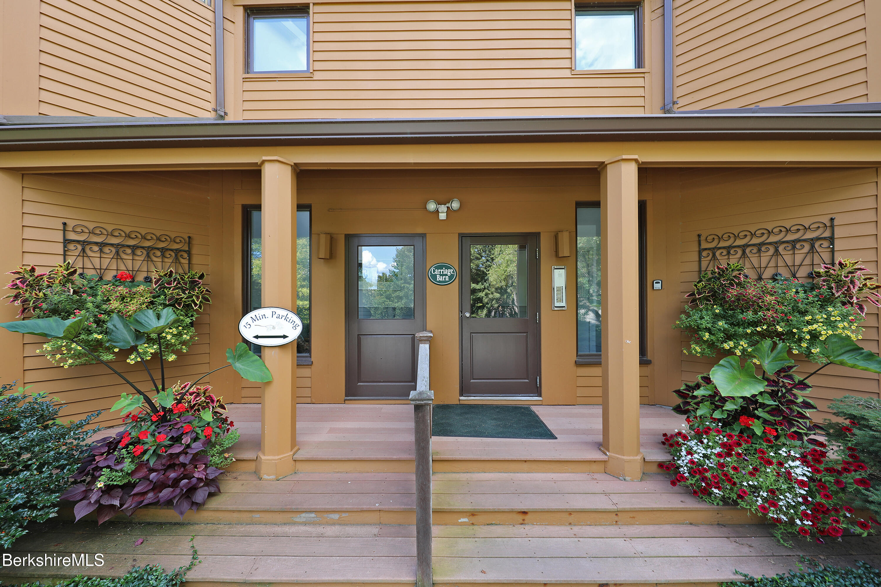 19 Hawthorne Road, Unit CARRIAGE BARN E2 Stockbridge, MA 01262 - Photo 5 of 47 a front view of a house