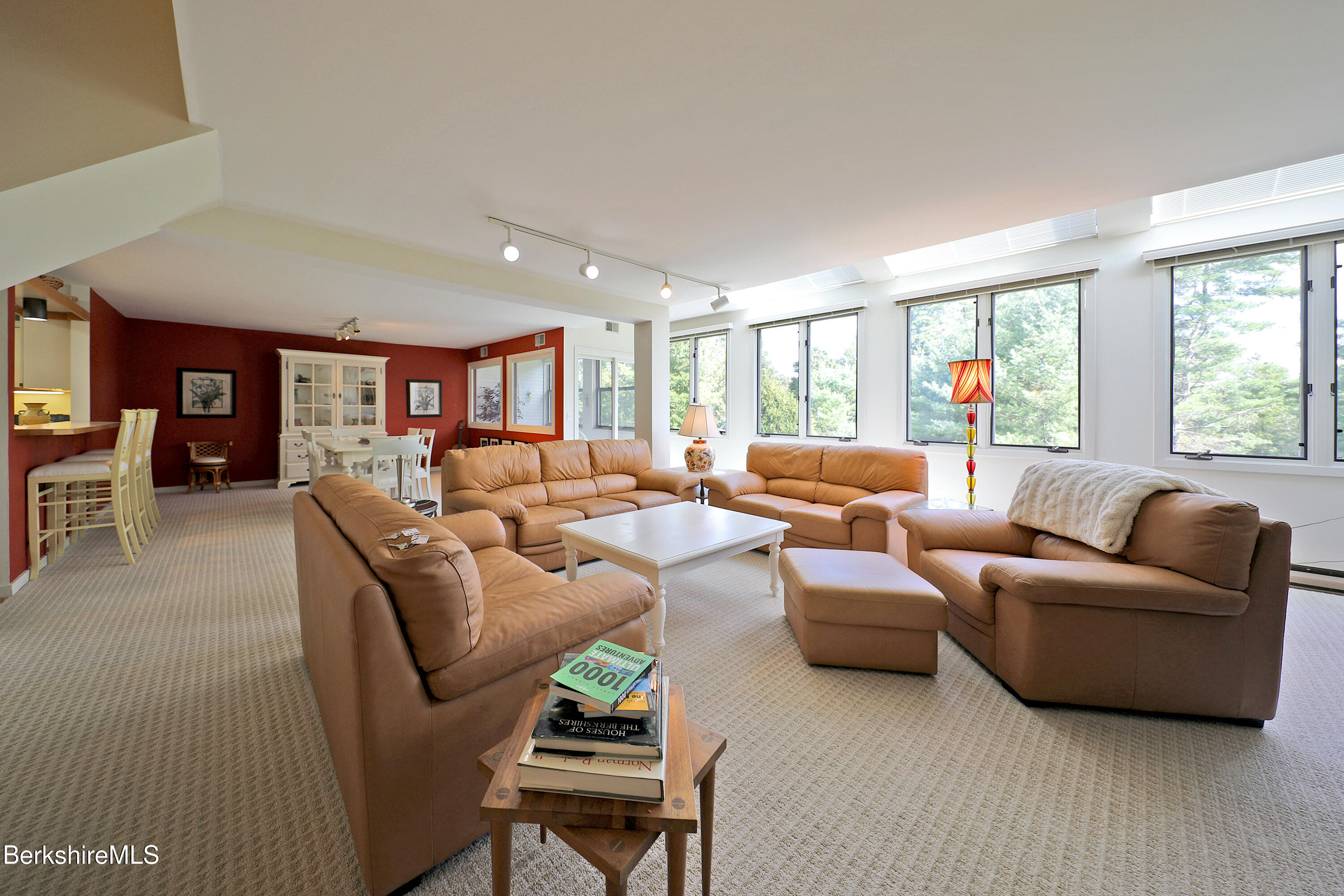 19 Hawthorne Road, Unit CARRIAGE BARN E2 Stockbridge, MA 01262 - Photo 6 of 47 a living room with furniture and a large window