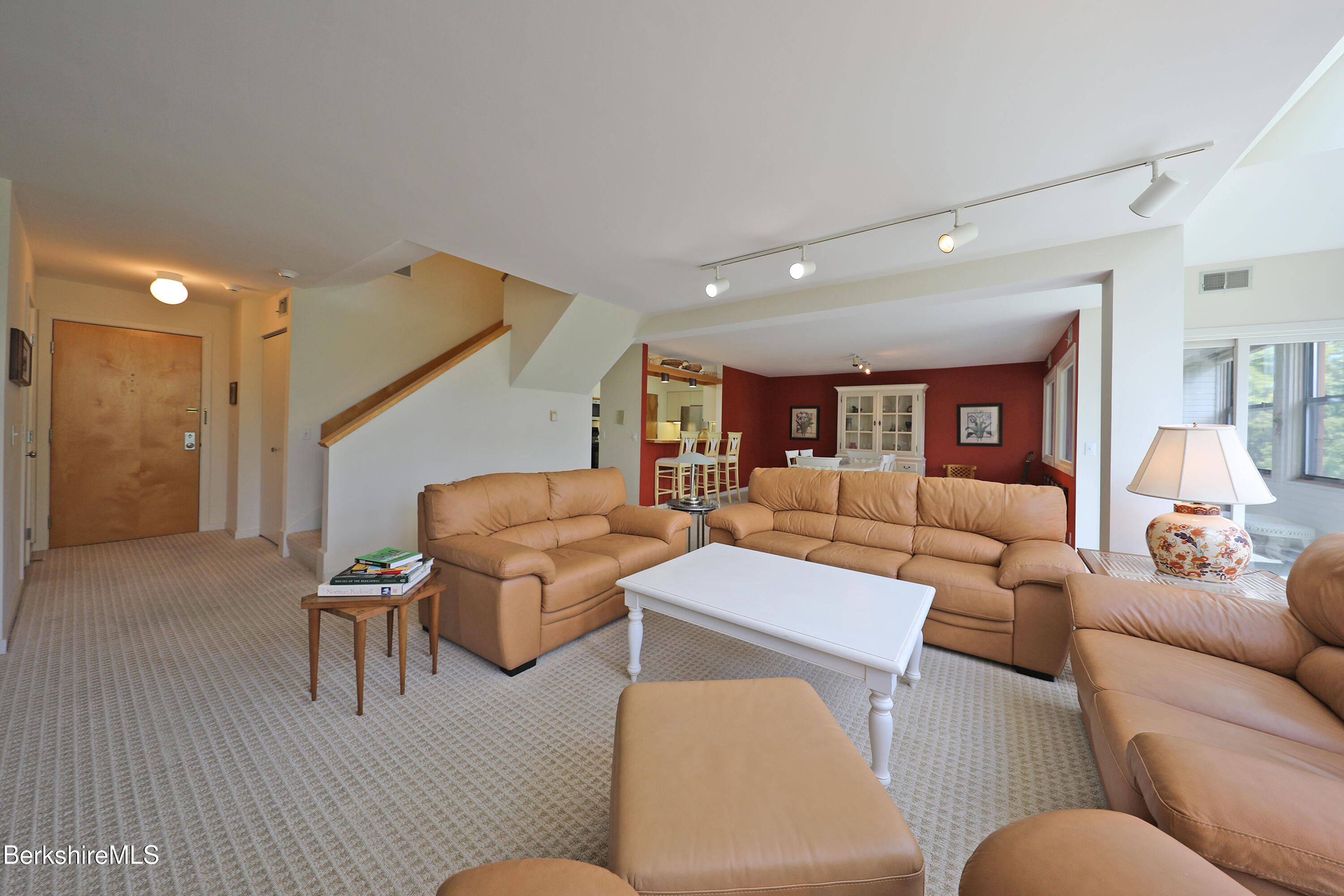 19 Hawthorne Road, Unit CARRIAGE BARN E2 Stockbridge, MA 01262 - Photo 47 of 47 a living room with furniture and a wooden floor