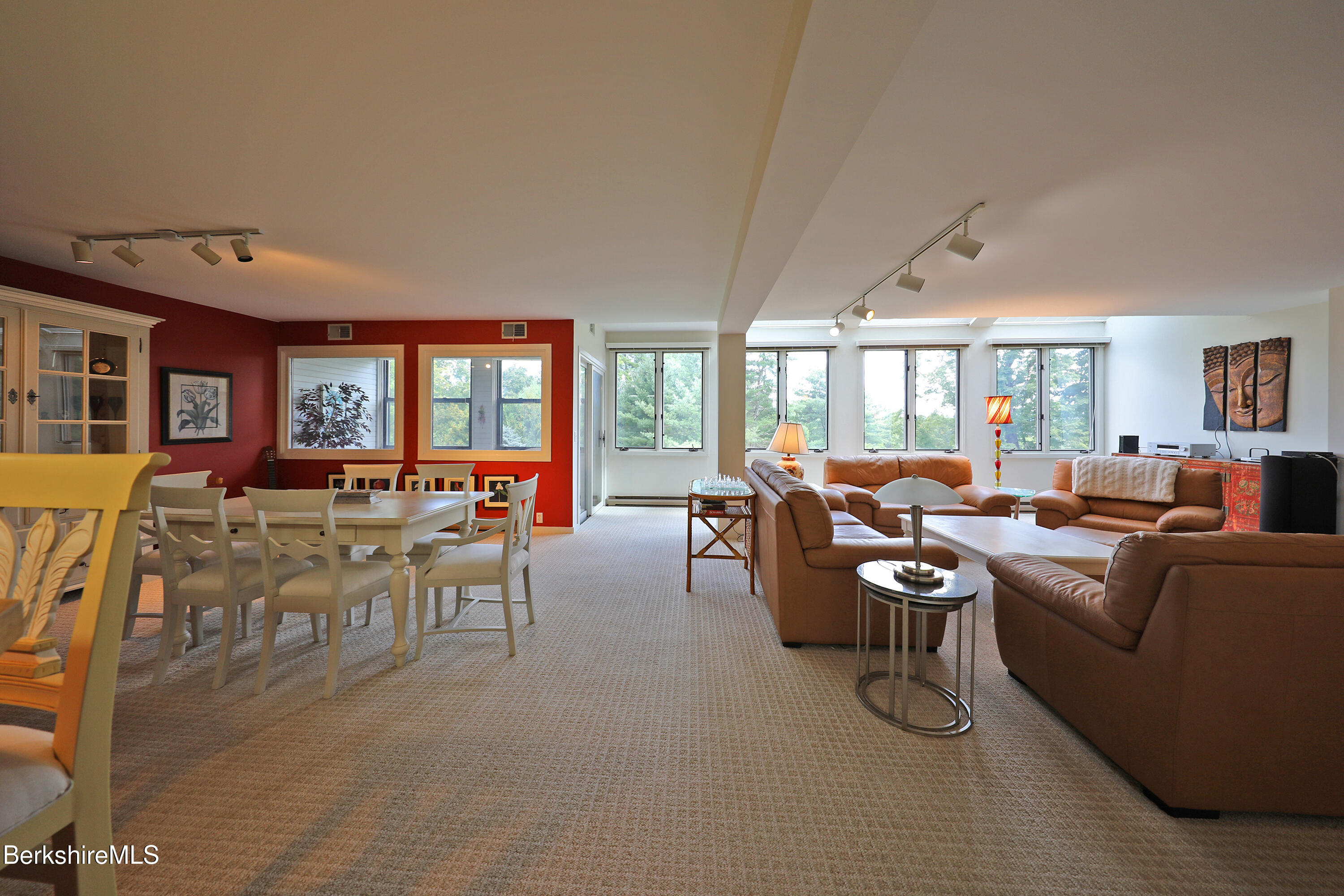19 Hawthorne Road, Unit CARRIAGE BARN E2 Stockbridge, MA 01262 - Photo 9 of 47 a living room with furniture and a large window