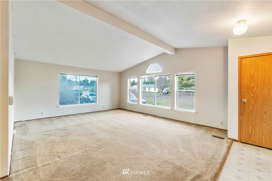 6023 188th Avenue Southwest Rochester, WA 98579 - Photo 5 of 30 an empty room with windows