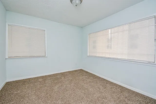 a view of a window in an empty room