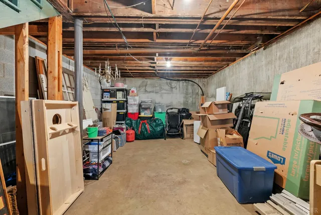 an aerial view of a house with a yard and garden