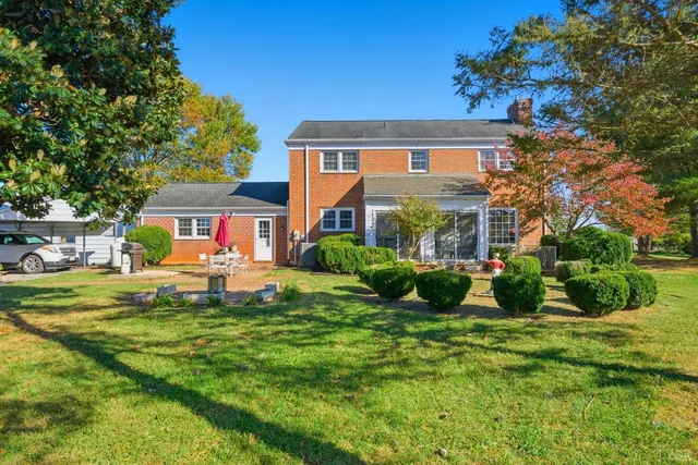 a stove top oven sitting inside of a kitchen