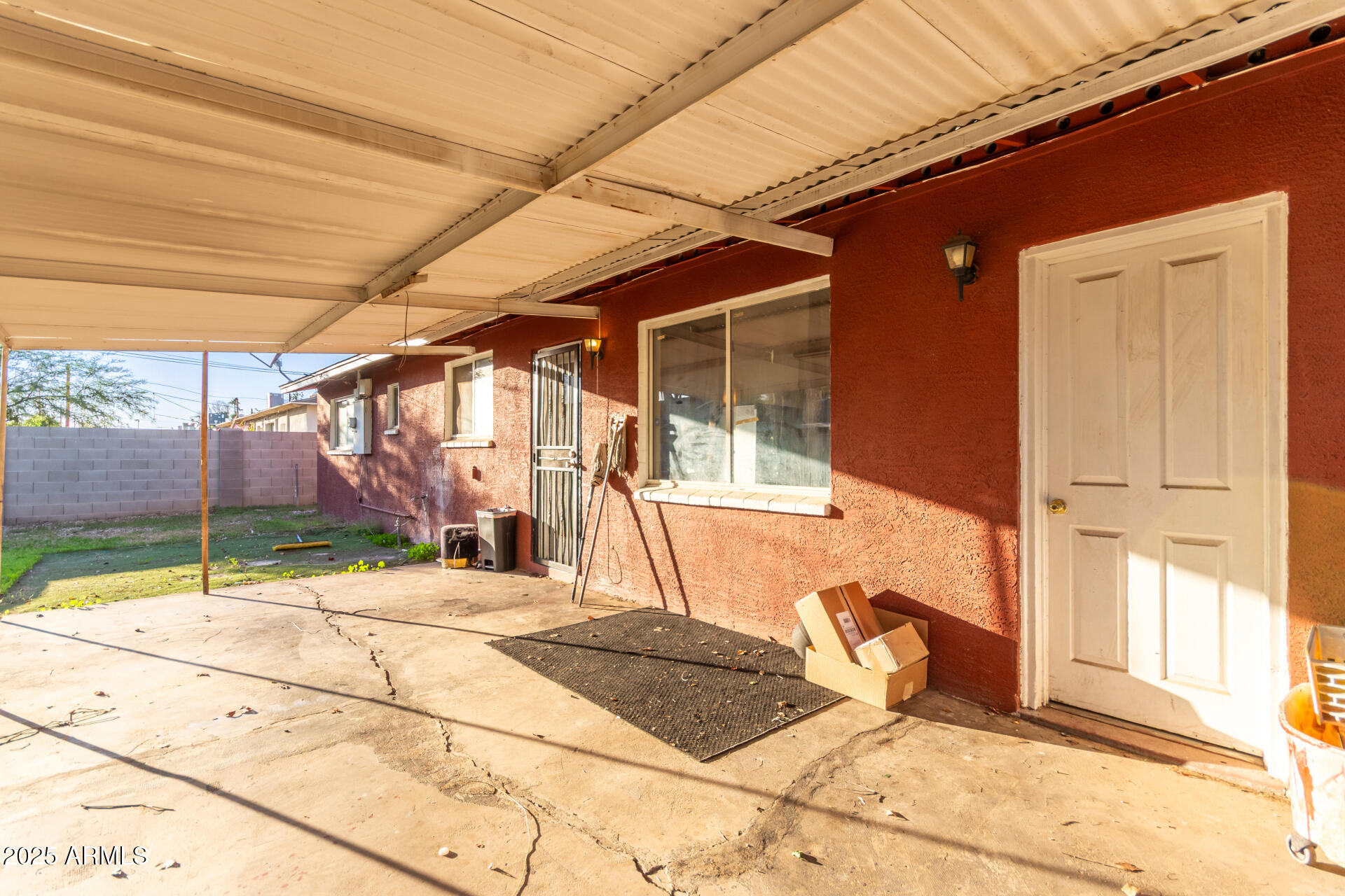 4727 West Osborn Road Phoenix, AZ 85031 - Photo 20 of 22 a view of a backyard with a patio