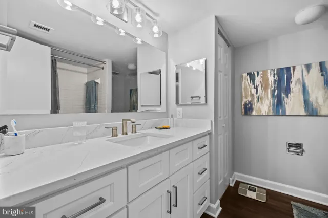 a bathroom with a bath tub