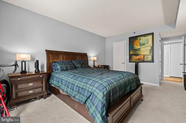 a living room with lots of furniture and a rug