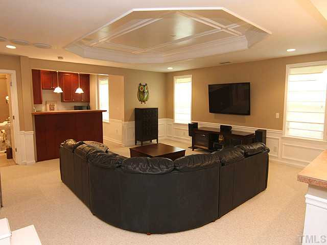 7732 Silver View Lane Raleigh, NC 27613 - Photo 12 of 25 Lower level recreational area includes a playroom, full bath, kitchenette, pool table area and extra storage!! Media Room