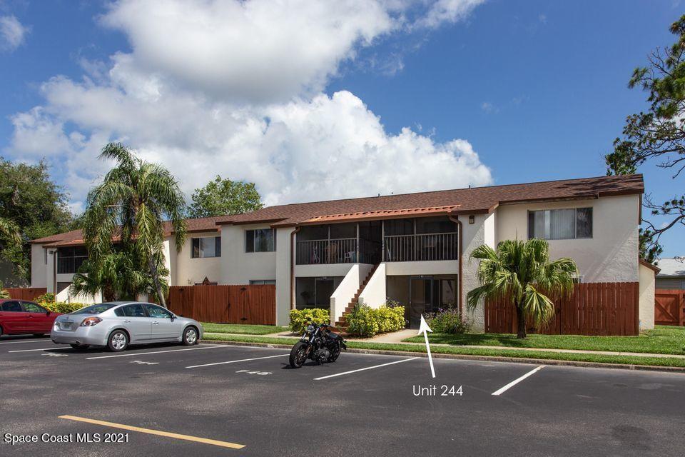 744 Ridge Club Drive, Unit 55 Melbourne, FL 32934 - Photo 1 of 15 a view of a car park in front of house