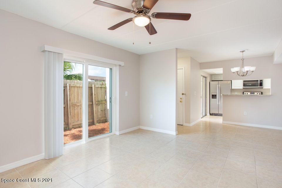 744 Ridge Club Drive, Unit 55 Melbourne, FL 32934 - Photo 7 of 15 a view of a kitchen with a sink and cabinet area