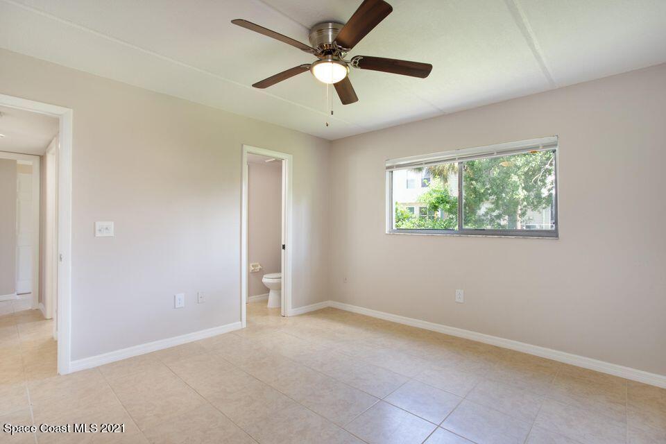 744 Ridge Club Drive, Unit 55 Melbourne, FL 32934 - Photo 8 of 15 a view of an empty room with a window