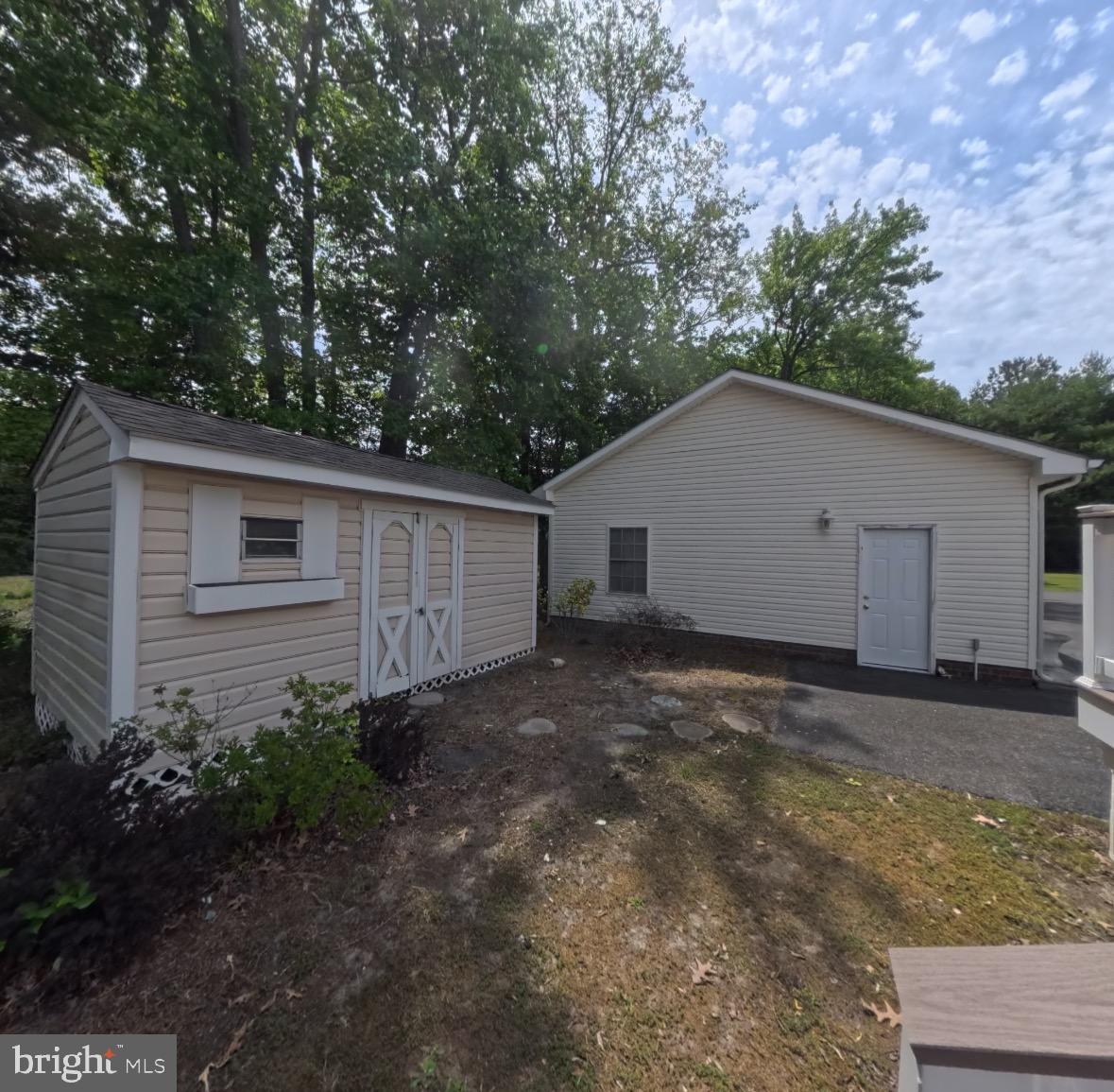 110 East Harbor Drive Reedville, VA 22539 - Photo 24 of 27 Side entrance to Three Car Garage. Shed