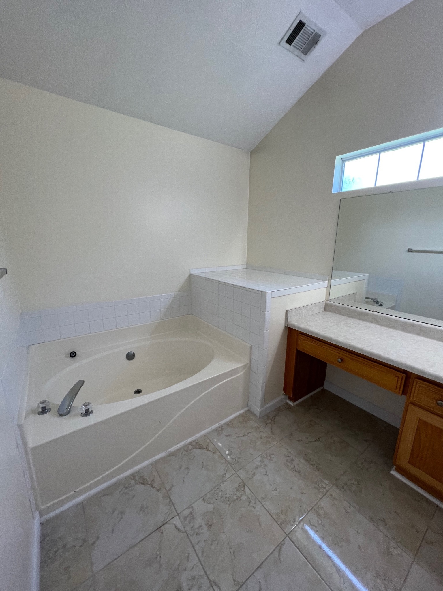 3769 Stagecoach Pass Ellenwood, GA 30294 - Photo 12 of 23 a bathroom with a tub sink and mirror