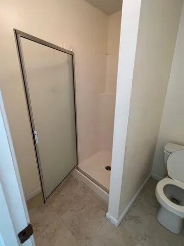 a bathroom with a sink and toilet
