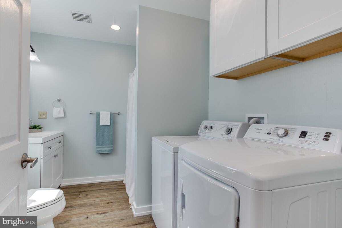 5229 Breezy Point Road Chesapeake Beach, MD 20732 - Photo 25 of 48 Bathroom and laundry room