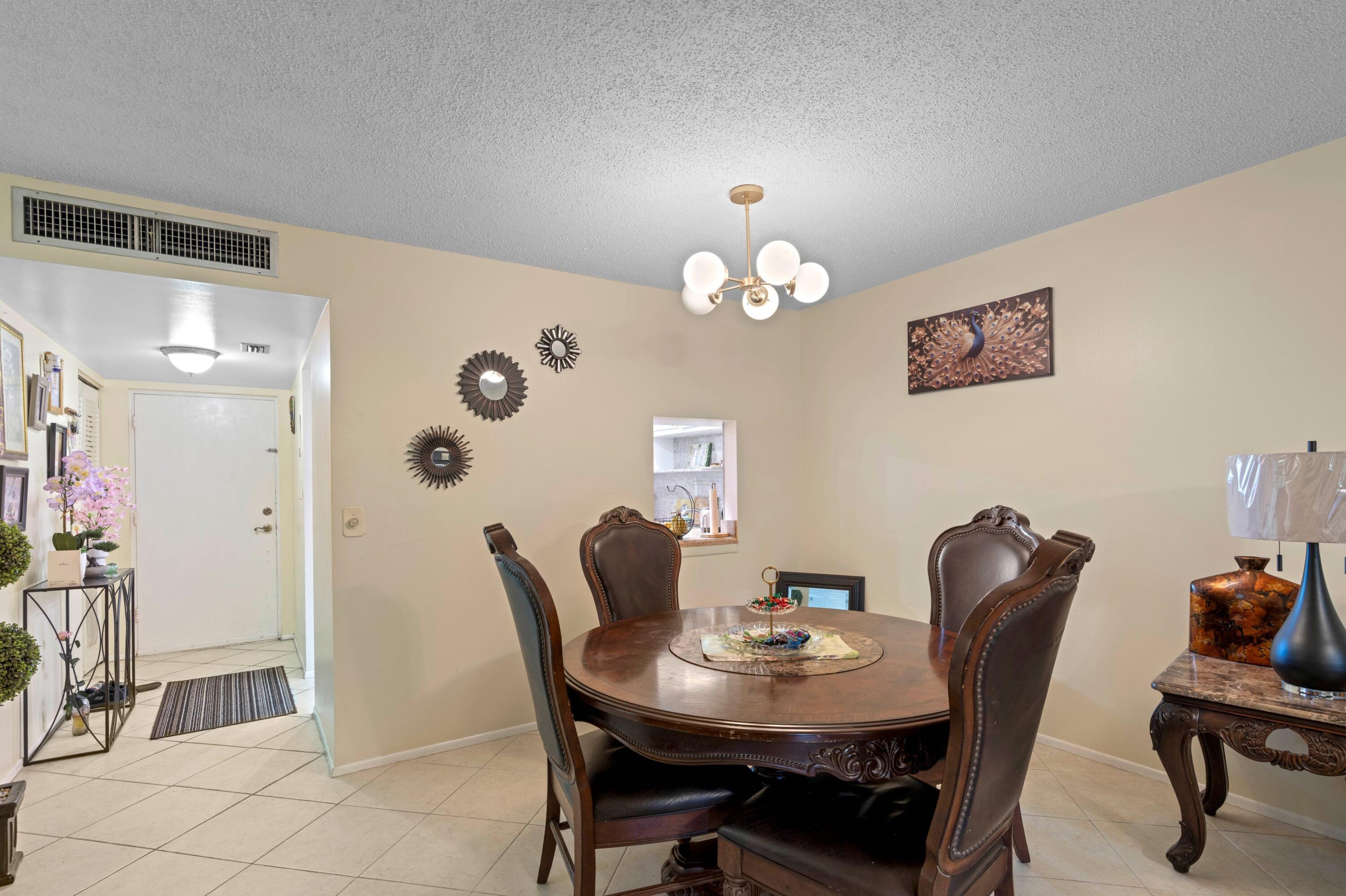 5961 Northwest 2nd Avenue, Unit 209 Boca Raton, FL 33487 - Photo 7 of 35 Dining Area