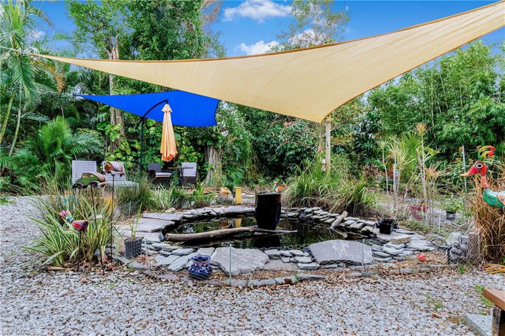 10931 Russell Road Bokeelia, FL 33922 - Photo 41 of 50 a view of outdoor space with seating area