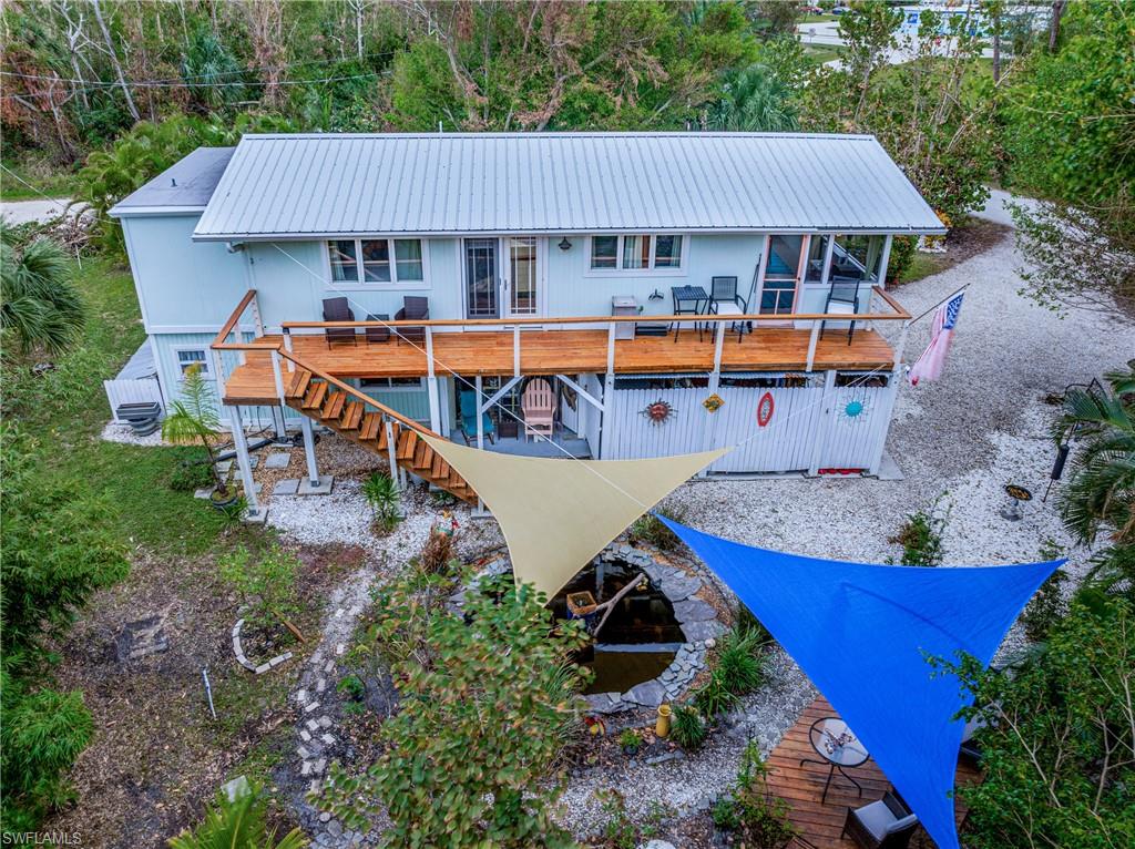 10931 Russell Road Bokeelia, FL 33922 - Photo 45 of 50 an aerial view of a house