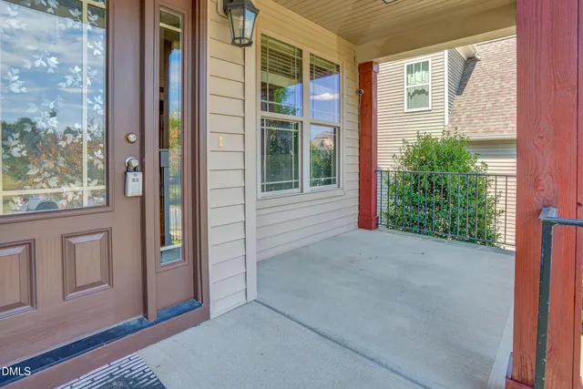 front view of a house with a small yard