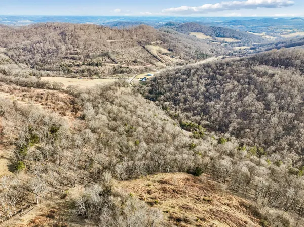 a view of mountains and valleys