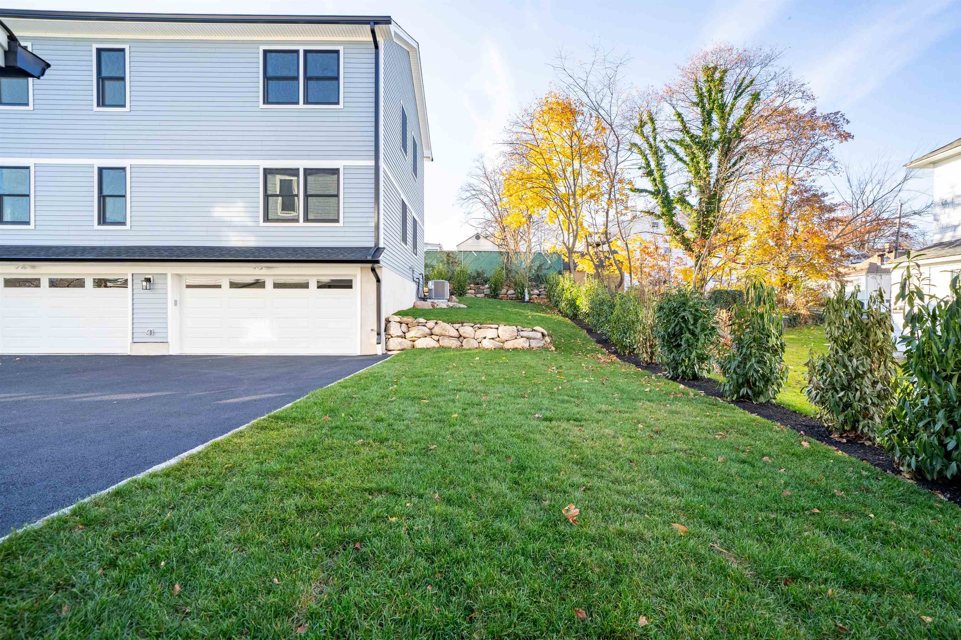 20 Orchard Street, Unit 1 Morristown, NJ 07960 - Photo 24 of 25 a view of a house with a yard