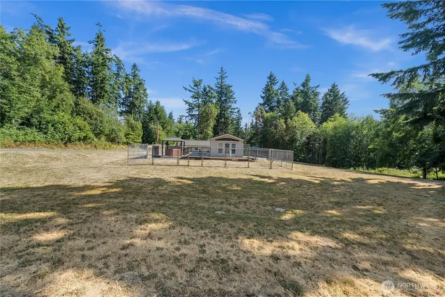 a house with trees in the background
