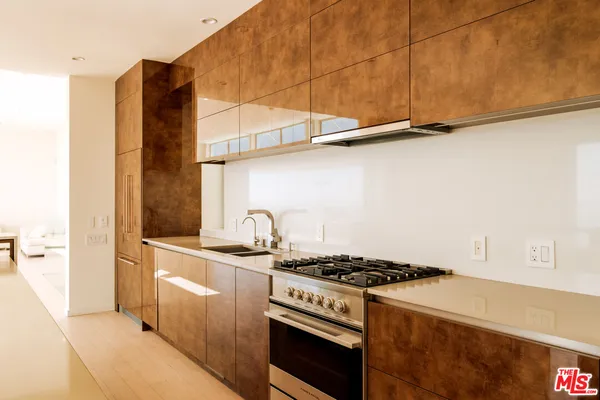 a view of an empty room and a window