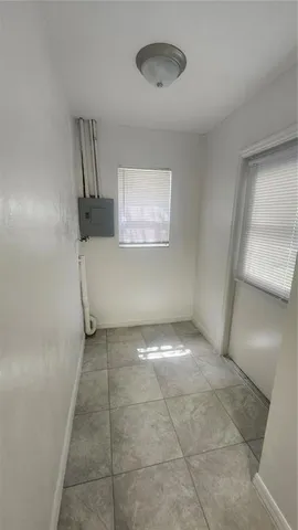 a large bathroom with a sink and a mirror