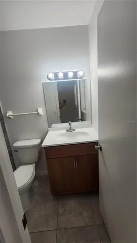 an empty room with a mirror
