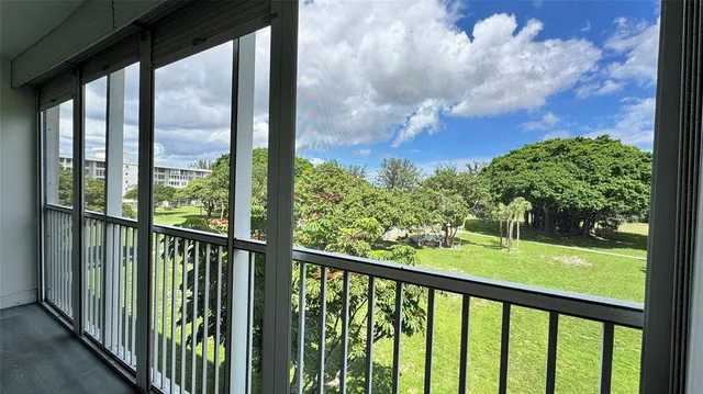 a view of a porch with a yard