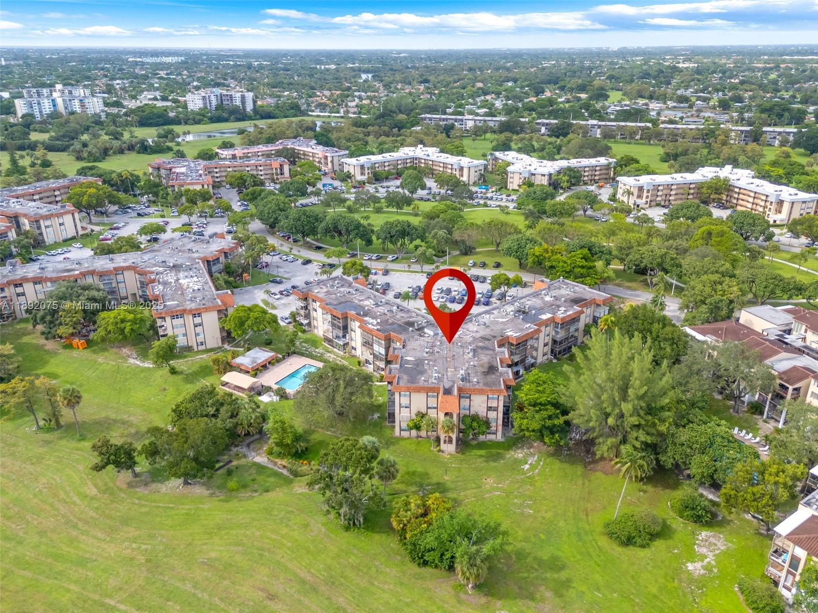 6100 South Falls Cir Drive, Unit 410 Lauderhill, FL 33319 - Photo 34 of 39 an aerial view of residential house with outdoor space and trees all around