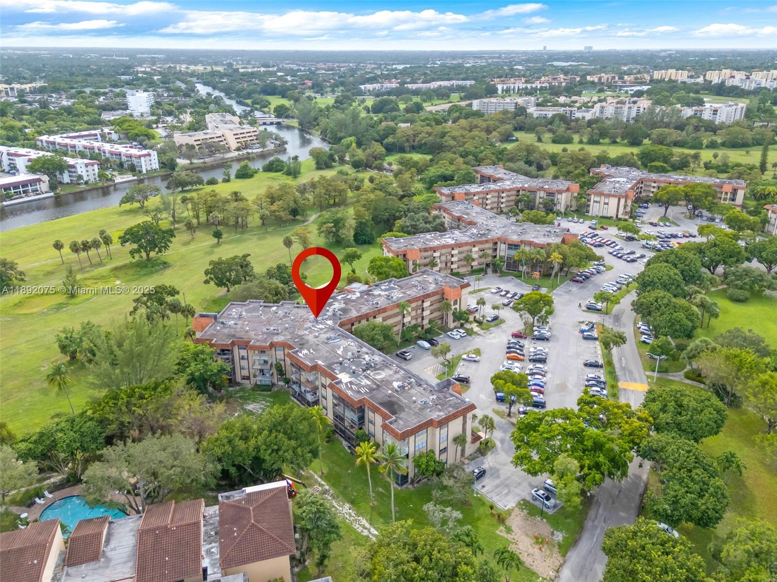 6100 South Falls Cir Drive, Unit 410 Lauderhill, FL 33319 - Photo 36 of 39 an aerial view of residential houses with outdoor space and river