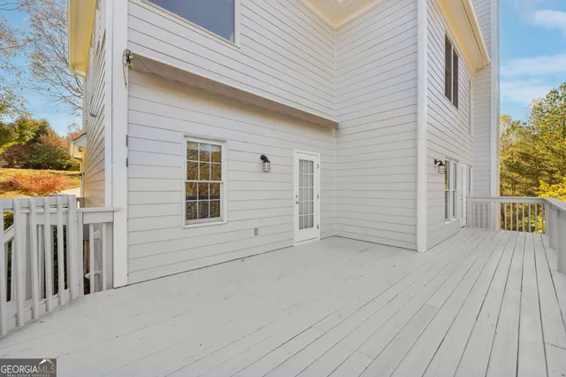 a view of a livingroom with furniture and hardwood floor