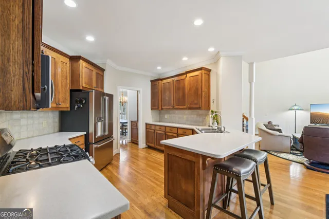 a spacious bathroom with a double vanity sink and a mirror