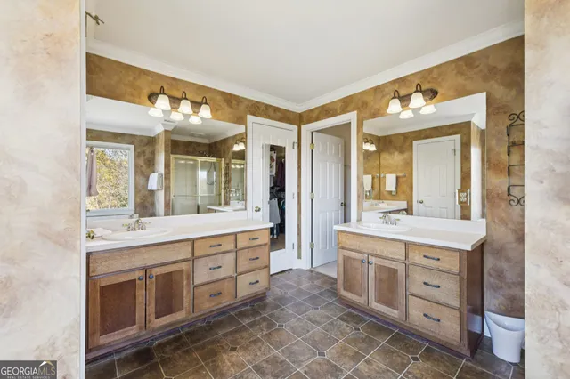 a view of a field with trees in the background