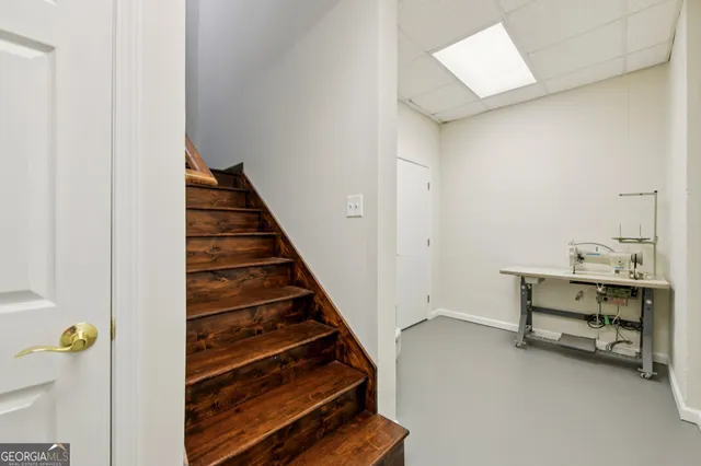 an aerial view of residential house and green space