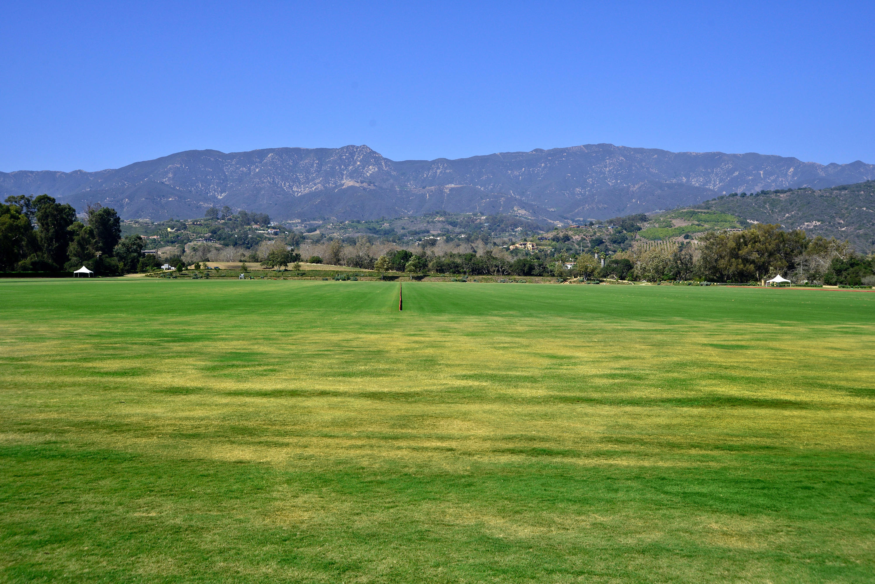 200 Lambert Road Carpinteria, CA 93013 - Photo 19 of 25 a view of a lush green hillside and a houses