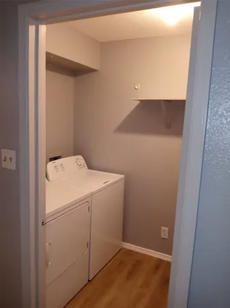 a kitchen with a refrigerator sink and stove