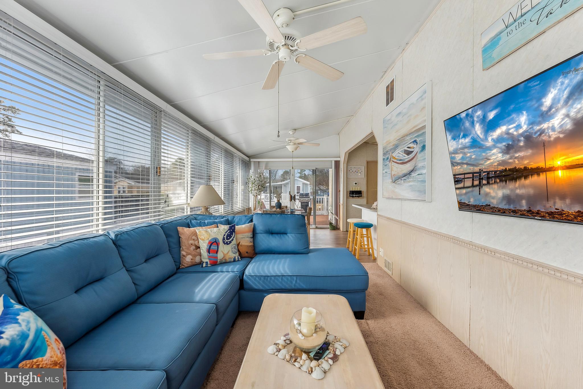 169 Edson, Unit 169 Woodbine, NJ 08270 - Photo 11 of 45 a living room with furniture and a large window