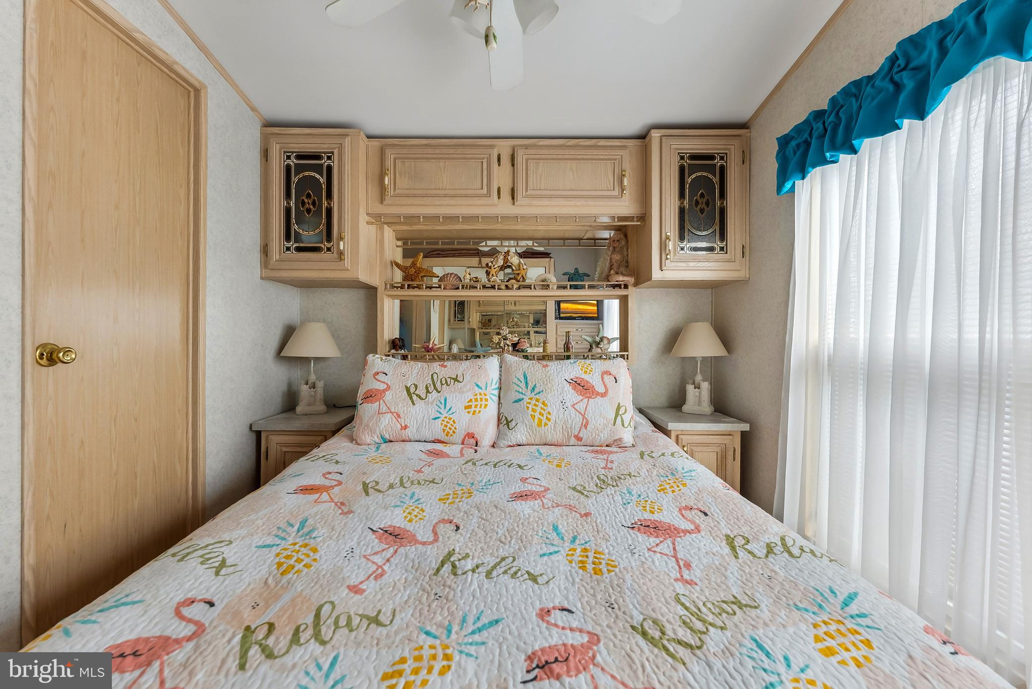 169 Edson, Unit 169 Woodbine, NJ 08270 - Photo 14 of 45 a bedroom with a bed and wooden floor