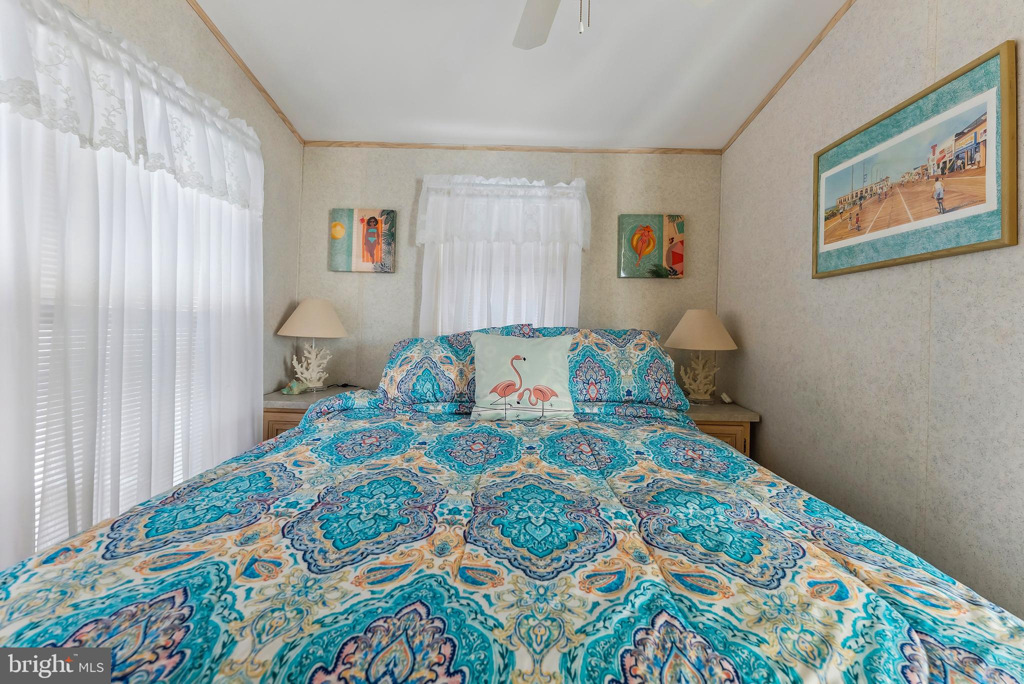 169 Edson, Unit 169 Woodbine, NJ 08270 - Photo 17 of 45 a bedroom with a bed and a painting on the wall