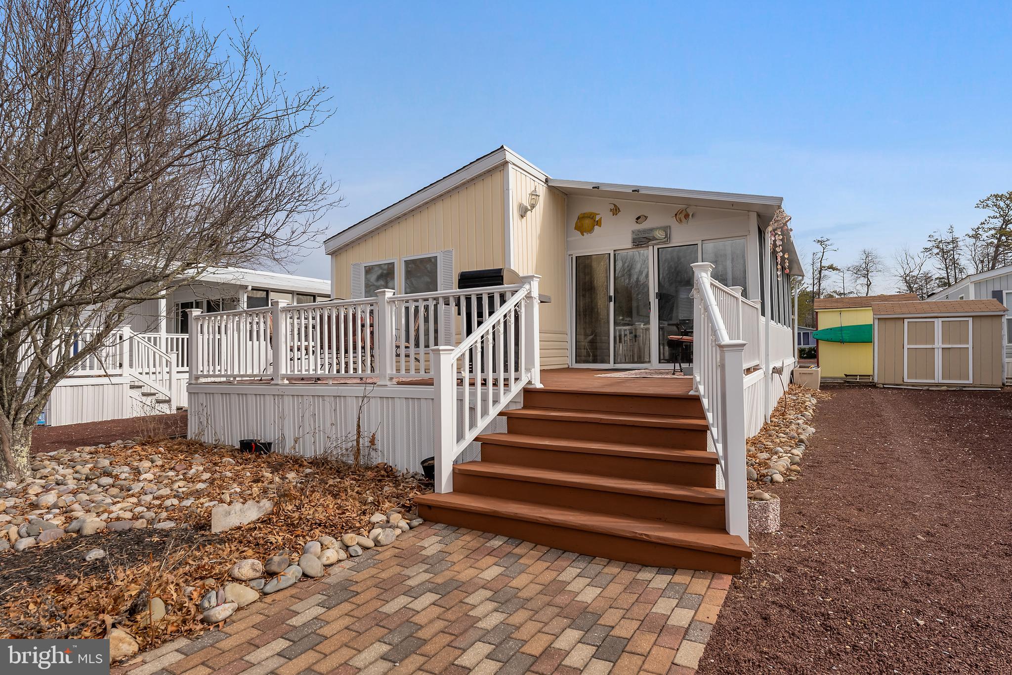 169 Edson, Unit 169 Woodbine, NJ 08270 - Photo 20 of 45 a view of a house with backyard and deck