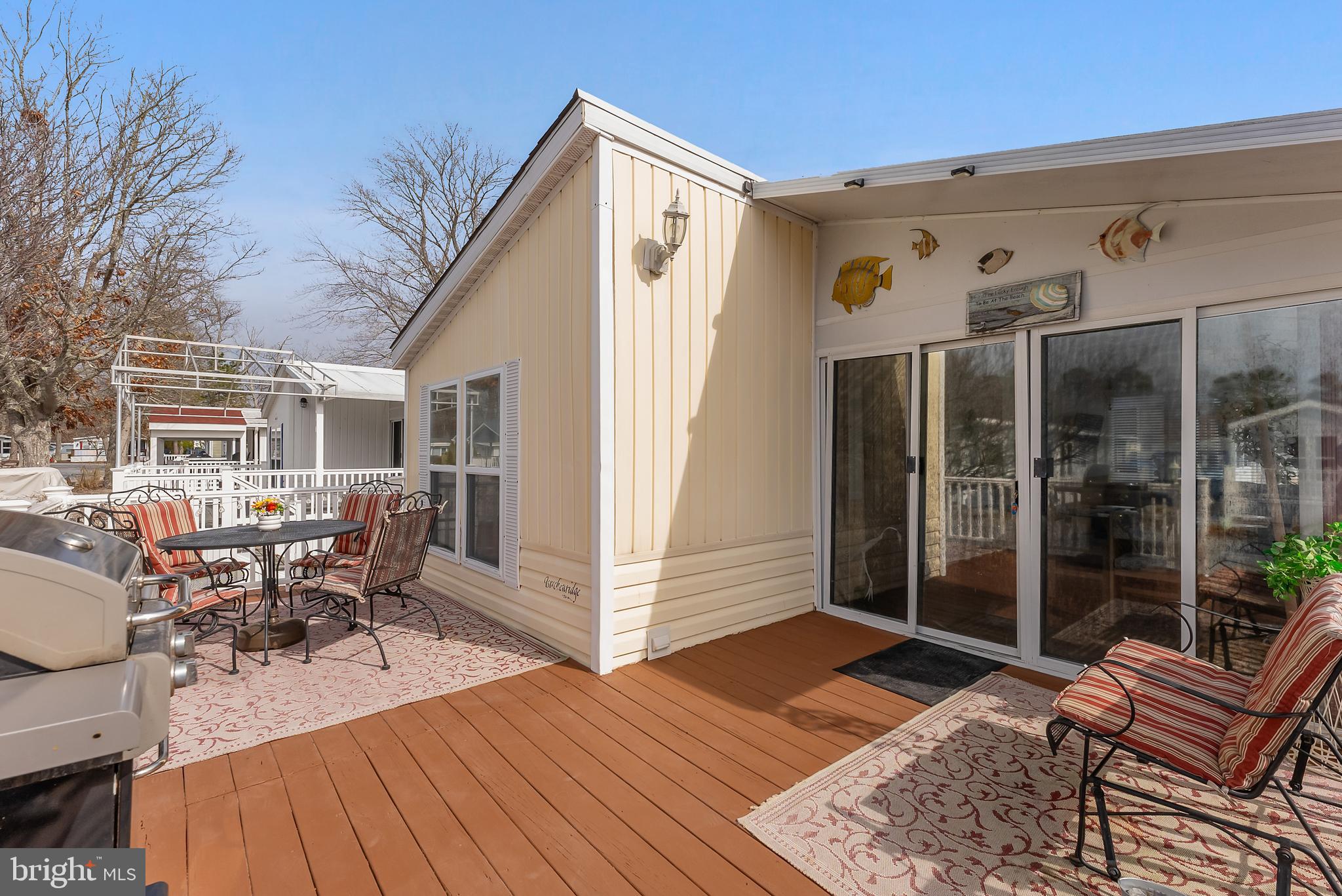 169 Edson, Unit 169 Woodbine, NJ 08270 - Photo 21 of 45 a outdoor space with patio the view and wooden floor